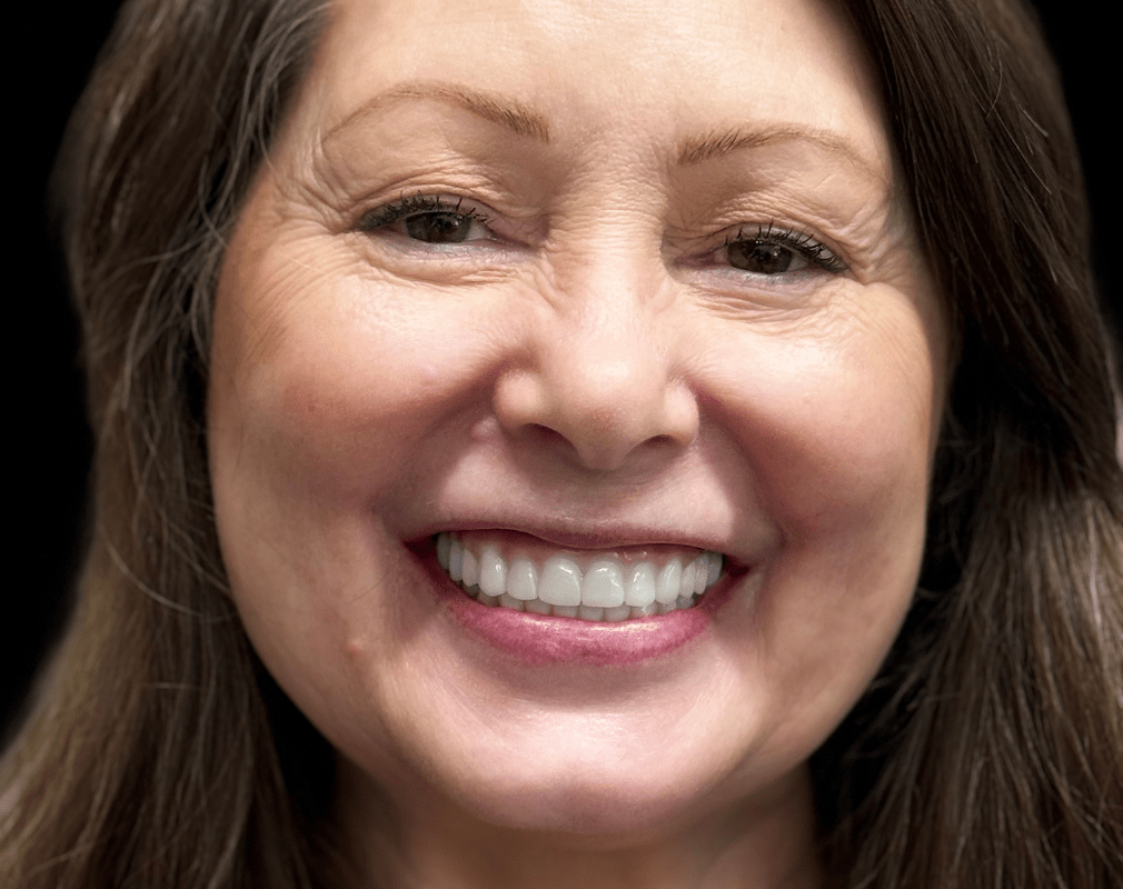 Smiling woman with long hair