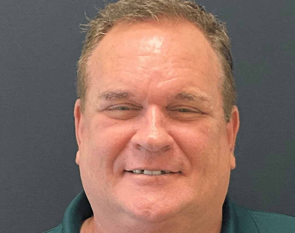Smiling man with short hair